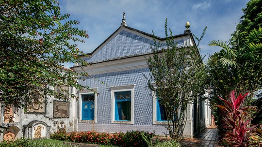 Por que João Gomes não encontrou quem projetasse sua casa brasileira?