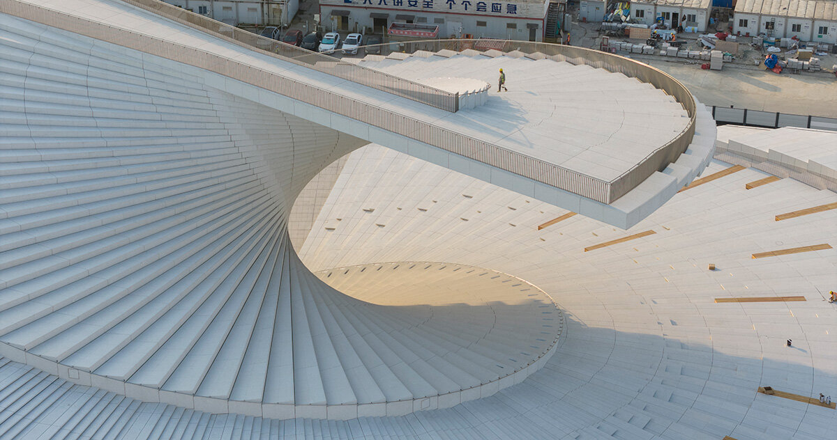 olhe para dentro da grande ópera de Xangai em espiral de Snohetta