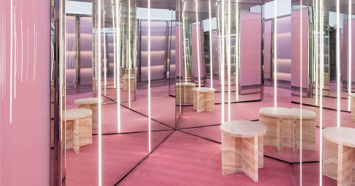 NM3 faz curadoria de blumarine milão com interiores em travertino e vidro rosa