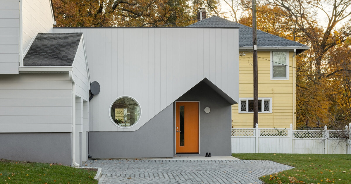 uma linha de fachada arrebatadora reinterpreta casas suburbanas de dois andares em Nova Jersey